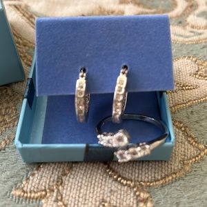 Earring and adjustable ring